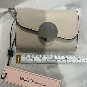 BCBGeneration Cream Wallet with Silver Detail